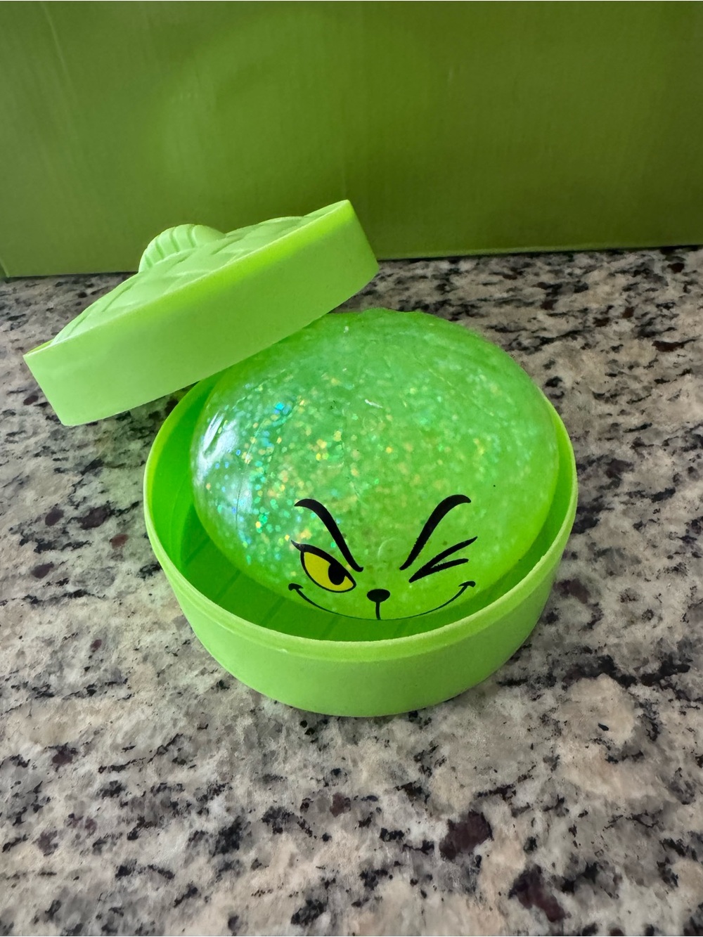 The Grinch Green Glitter Squishy Dumpling Winking Face with Storage Case - Picture 3 of 10